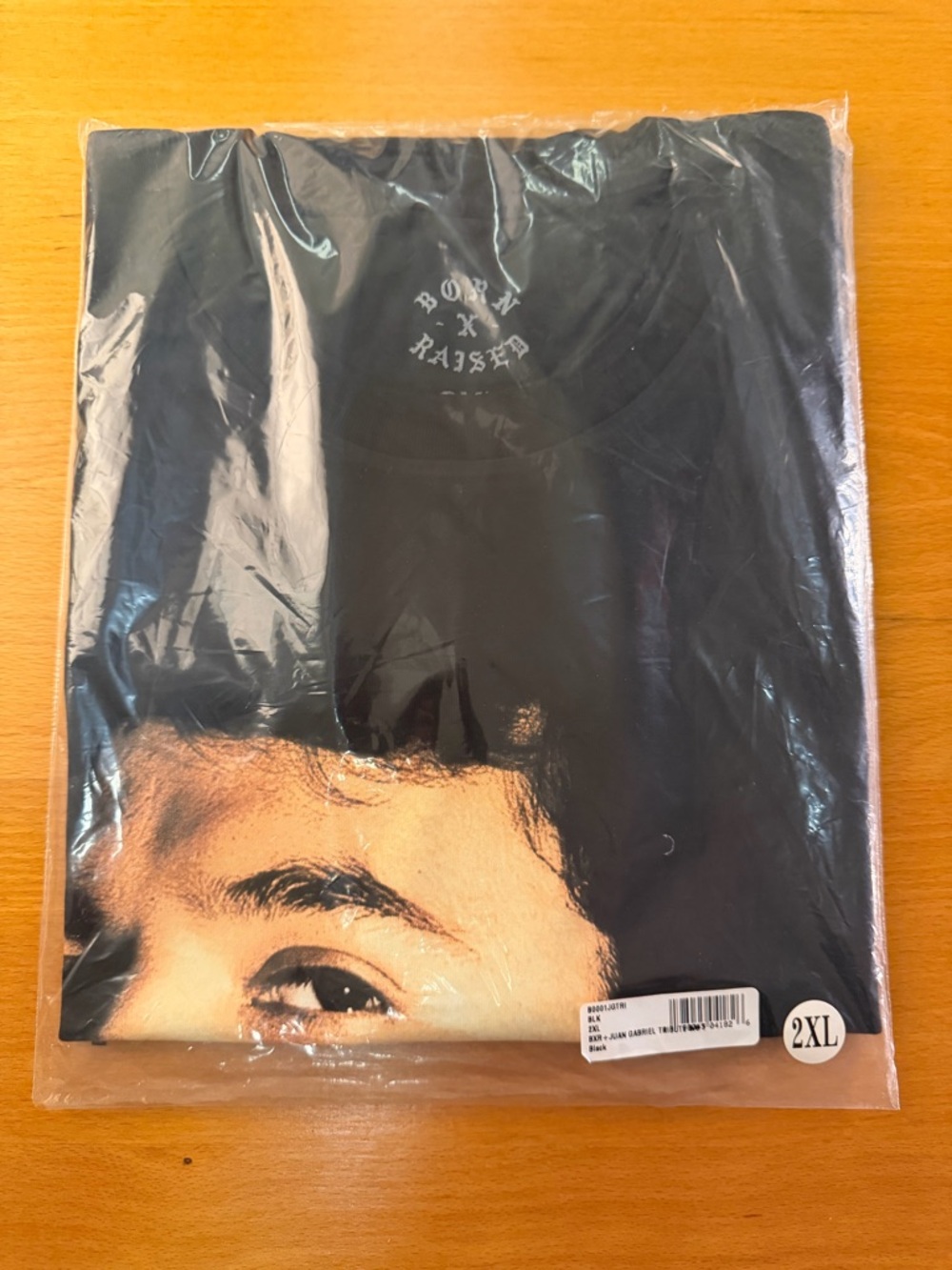 BORN X RAISED Black Short-Sleeve Graphic Tee. Juan Gabriel “Amor Eterno”